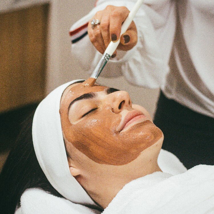 Woman during cosmetic treatment.