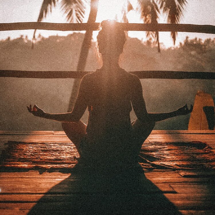 A girl is meditating.